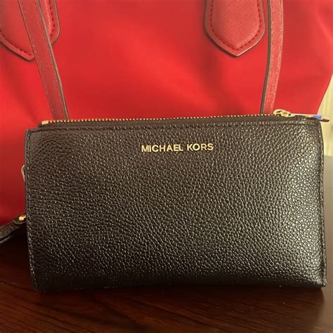 michael kors tan clutch wallet|michael kors black wristlet wallet.